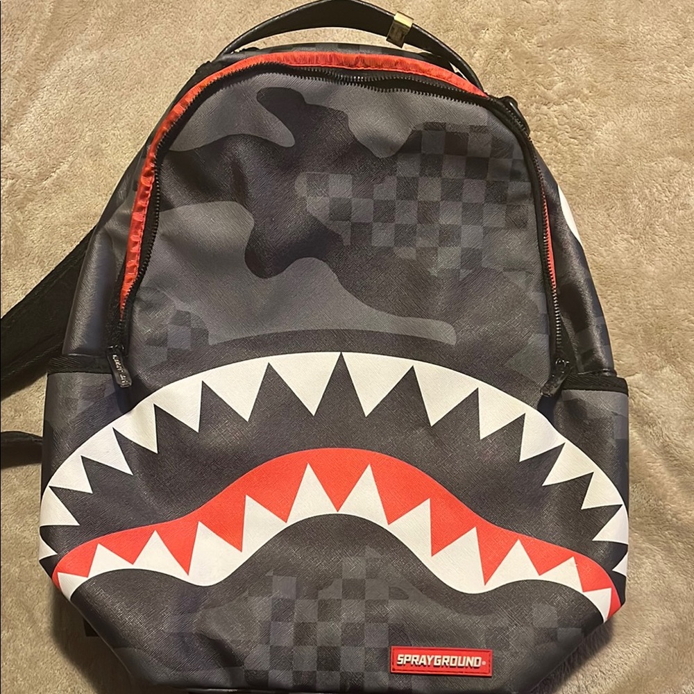 Sprayground Black and Red Shark Mouth Backpack